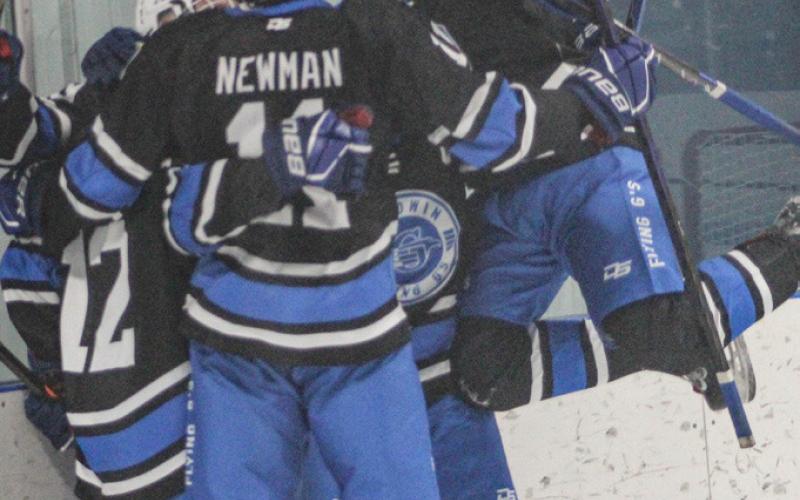 The celebration is on behind the Genesee net after Parker Woods scored to give Gladwin the lead late in Saturday’s victory.