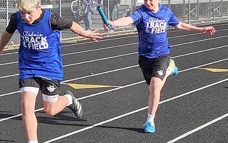 Lucas Evans and Owen Klein completed a great handoff in the 4x200 meter relay.