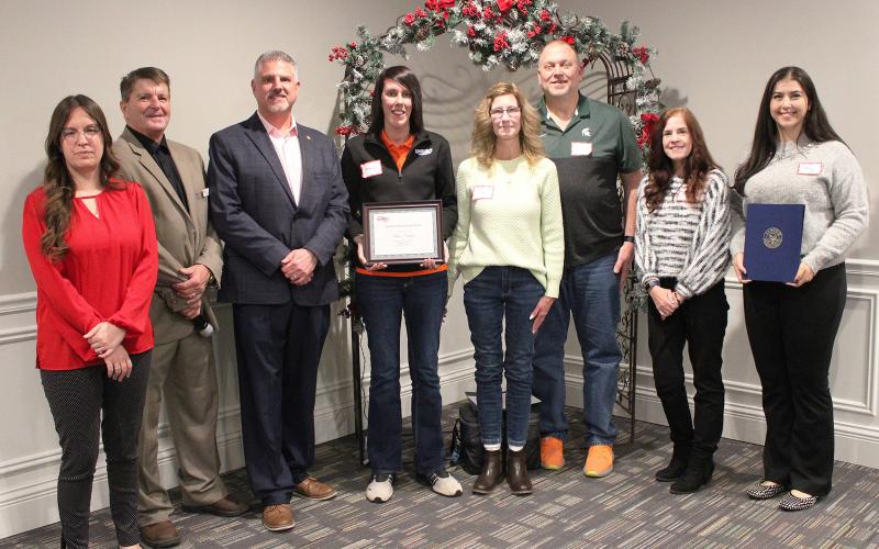 Pictured left to right are Michigan Works! Region 7B Area Manager Amber Davies; Michigan Works! Region 7B Executive Director Mark L. Berdan; State Representative Michael Hoadley; Alecia Vaughn with her parents Julie and Robert; Gladwin County Commissioner Karen Moore; and Constituent Relations Representative Ashley Elfawal, the Office of Congressman John Moolenaar.