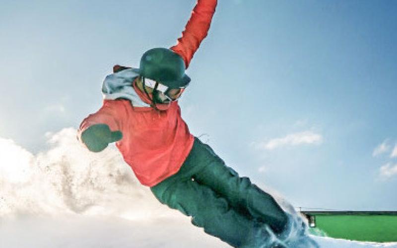 A skier at Nub’s Nob in Harbor Springs, one of the 33 resorts that participate in a White Gold Card promotion.