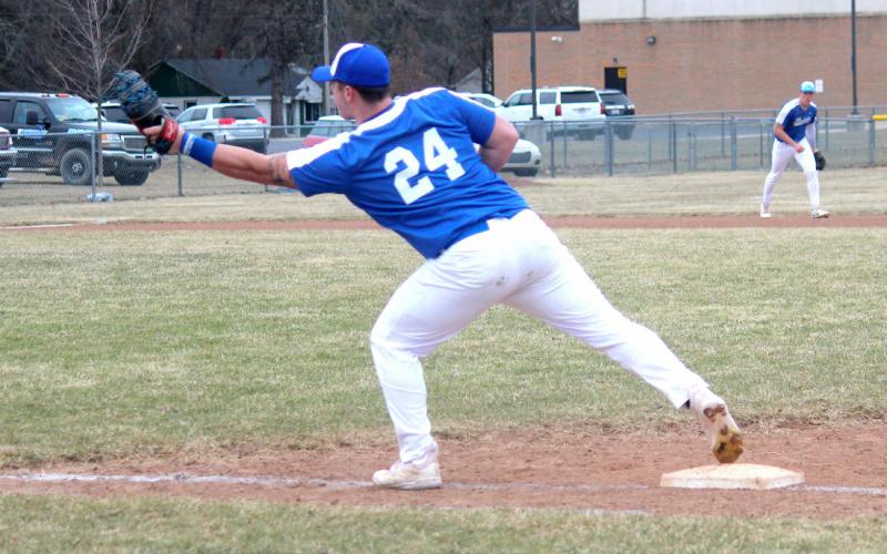 First baseman Lincoln McKinnon makes the catch to record the out.