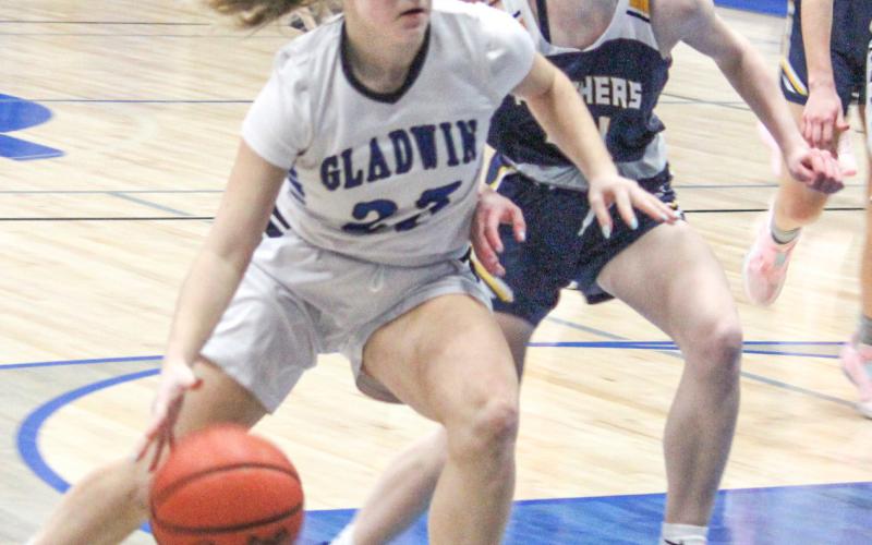 Liz Winchester and Gladwin are closing the regular season on a high note and will host a district tournament next week.