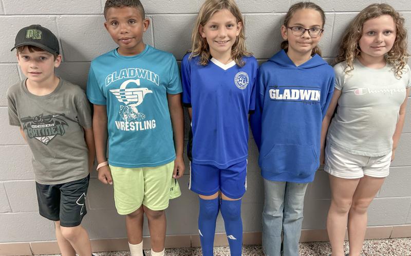 Pictured are fourth graders: Dustin Yost, Micah Prather, Marlin Fry, Charlotte Knapp, and Carla Saidla.