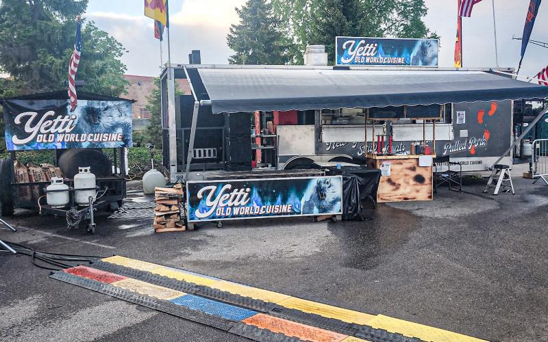 The Yetti Old World Cuisine Food Truck rolled into Novi recently and won two awards at a prestigious BBQ contest. Owners (inset, left to right) Greg, Tracy and Jon Curtis got some air time with Detroit TV newscaster Scott Wolchek.