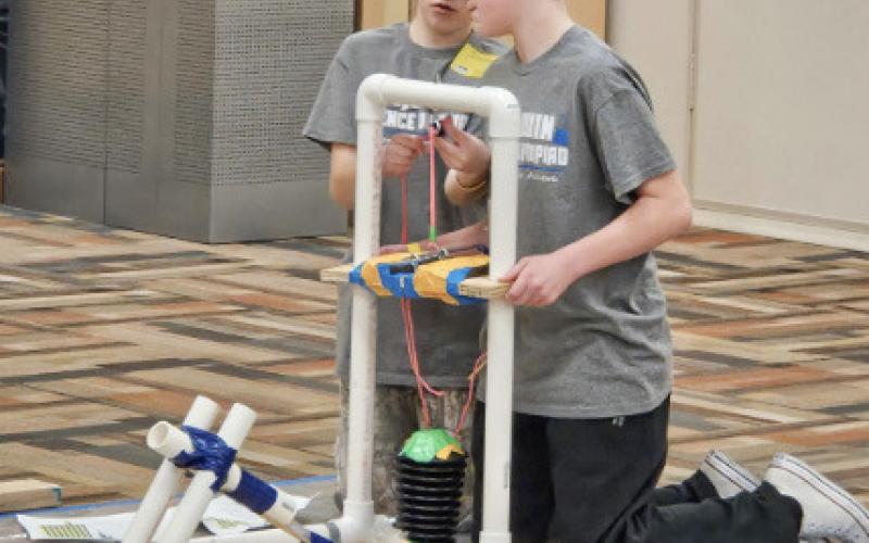 Jericho Barz and Brennan Smith discussing their strategy for hitting the target in Air Trajectory.