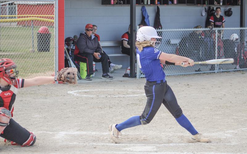 Gladwin’s Angelica Corlew helped power the offense as the Flying G’s swept three games Saturday to win the championship at the Coleman Invitational.