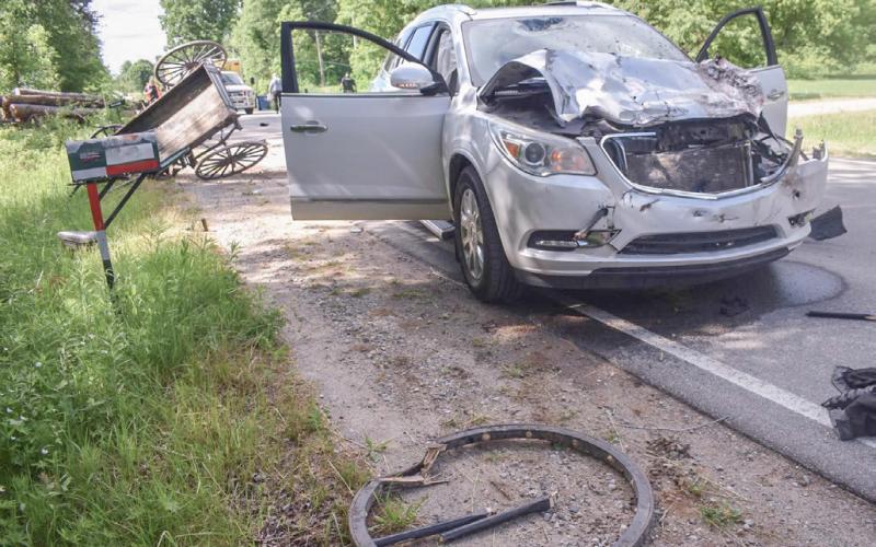 Amish buggy struck by vehicle