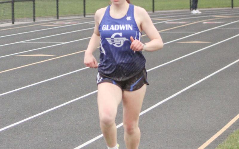 Gladwin’s Vivian Callaghan runs to a win in the 1600 meters during last Wednesday’s Jack Pine Conference event at Beaverton.