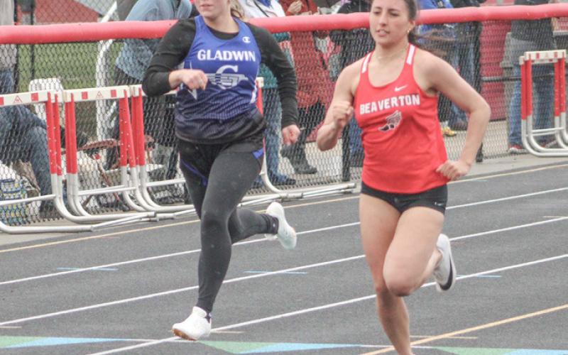 Beaverton’s Jaelyn Giner runs sixth with Audrey Schmidt eighth for Gladwin in the 100 meter dash at Wednesday’s meet.