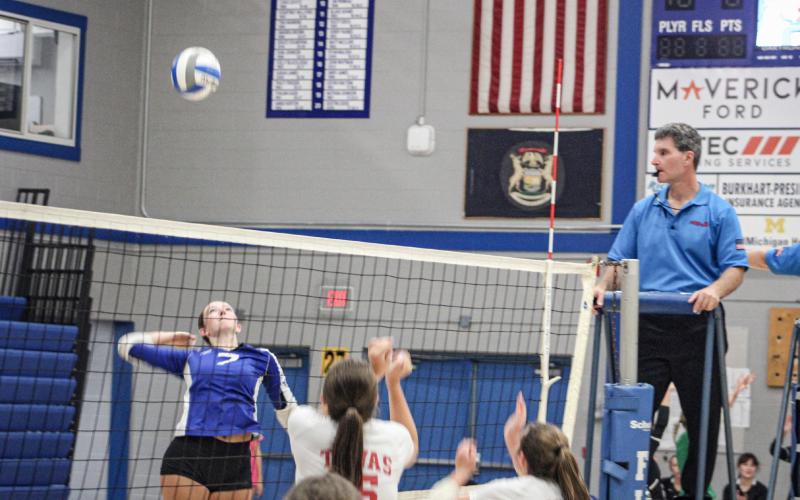 Gladwin’s Ansley Mausolf rises up for the kill during a match earlier this season. The Flying G’s will host Farwell this evening to open JPC action.