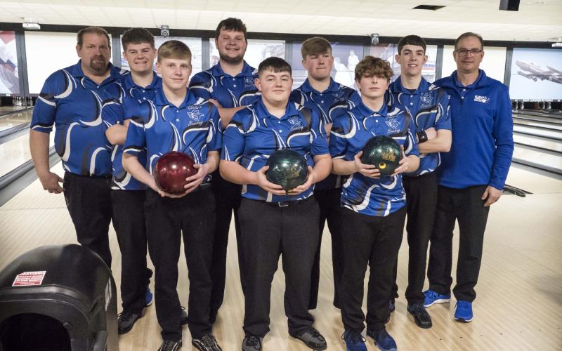 Gladwin High School Boys Bowling Team 2023. Pictured in front row, left to right: Harvey Zelt, Brayden Phillips, JR Phillips; back row: Coach Hager, John Corlew, Logan Klein, Hunter McDowell, Brady Weston, Coach VanTiem. Not pictured is Coach Crawford. The Gladwin Team went on to the Quarter Finals, falling to Lansing Catholic by 23 points. Lansing Catholic won the MHSAA State Championship defeating Ogemaw Heights in the tournament. PHOTO BY LEON LANGRIDGE