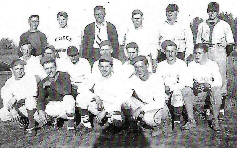 The 1940 Rhodes Baseball team, which included three members of the Carstens’ family: William (Bill), Sr., center backrow/manager, Cal Carstens, far right back row, and Robert Carstens, far right second row. Cal Carstens, who is being inducted posthumously at the 2025 NEM baseball reunion, had just joined the team as a pitcher, after playing minor league baseball for the Cincinnati Orinda Reds in California.