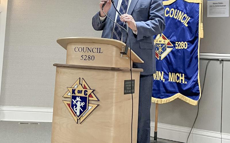 Congressman John Moolenaar addresses an occasionally feisty crowd at the Chamber of Commerce Legislative Breakfast Friday at the Knights of Columbus.