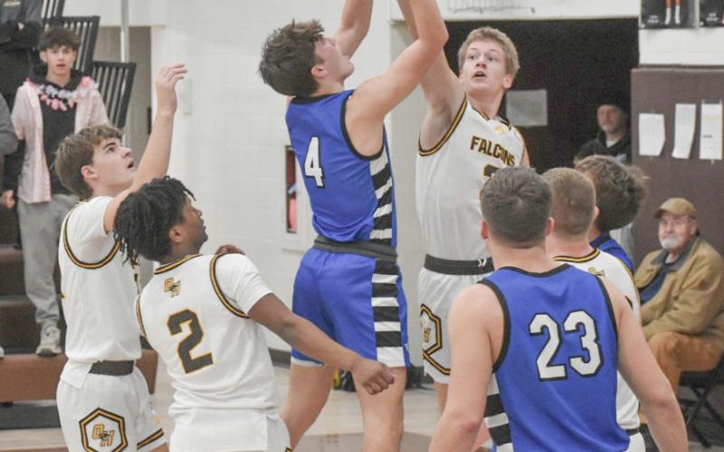 Ben Verellen takes it to the rim during Thursday night’s 64-60 victory at Ogemaw Heights, the 14th win in a row for the Flying G’s. PHOTO BY BETH ORR