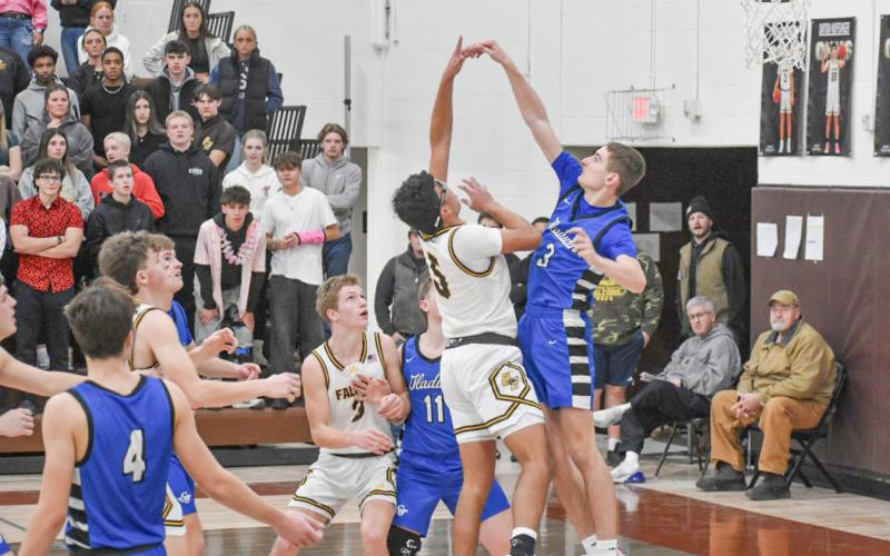 Gladwin’s Peyton Newman sends back a shot during Thursday night’s victory at Ogemaw Heights. BY BETH ORR