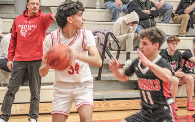 Beaverton’s Santi Panella looks for an open teammate during last week’s victory over visiting St. Louis.