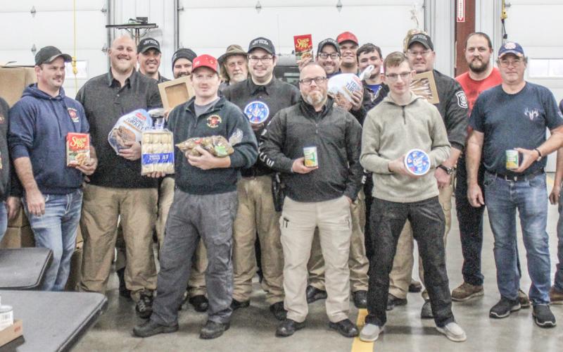 Meals were packed for delivery at the Beaverton Fire Department last year during the 7th annual Thanksgiving Dinner giveaway in 2023.
