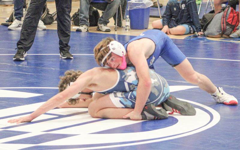 Gladwin’s Ethan Palmateer wrestled his way to the championship at 132 Saturday at the Manton Invitational.