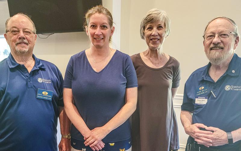 Pictured left to right: Dave Crawford, President; Carrie Will, Lori Johnson and Duane Miller, Membership Chairperson.
