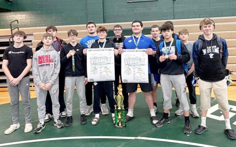 Gladwin boys and girls pin down titles in Grayling