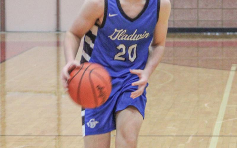 Gladwin’s Brody Verellen eyes the basket as he heads into the lane during last week’s win at Beaverton.