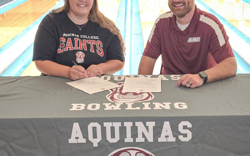 Gladwin graduate Skylar Davy signed a National Letter of Intent Friday to continue her bowling career at Aquinas College, which is led by Coach Harold Klukowski.