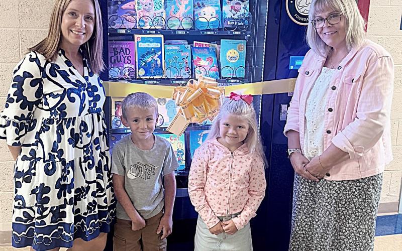 Gladwin Elementary School receives new book vending machine thanks to Sleepy Dog Foundation