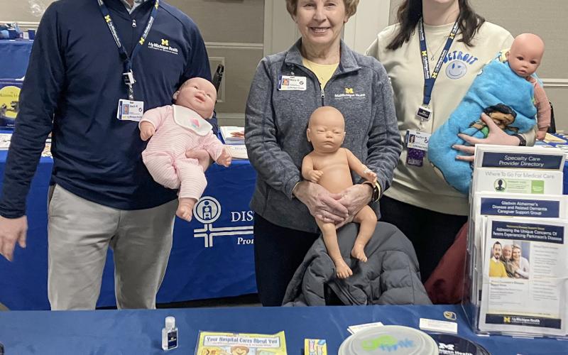 The My Michigan Health table provided info on safe sleep and choking prevention for babies at the Gladwin County Winter Carnival. Beaverton’s Lynn Heiple, meanwhile, gave out free haircuts.