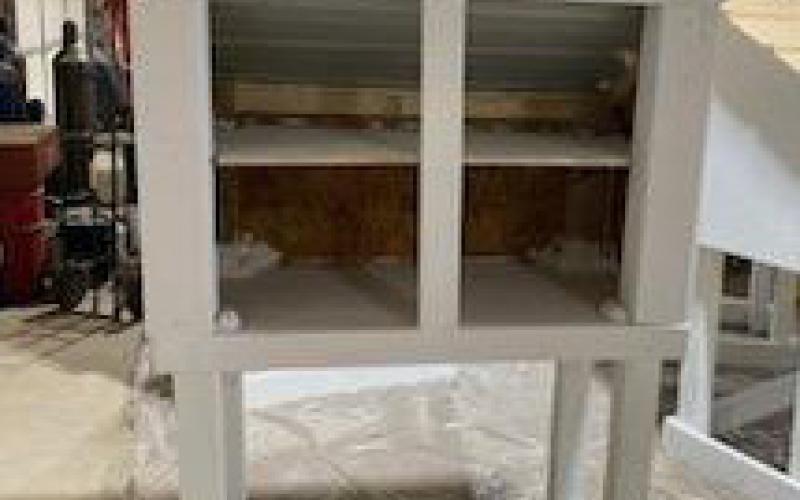 VOLUNTEERS BUILD COMMUNITY PANTRIES