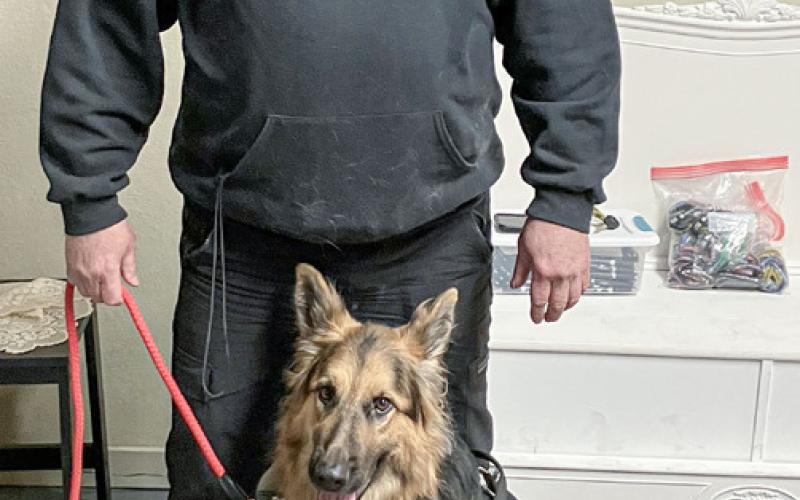 Ron Monroe of Mission Six Service Dogs brought Crocket to the American Legion Post 171 meeting Thursday night to discuss the benefits of matching trained dogs with disabled veterans.