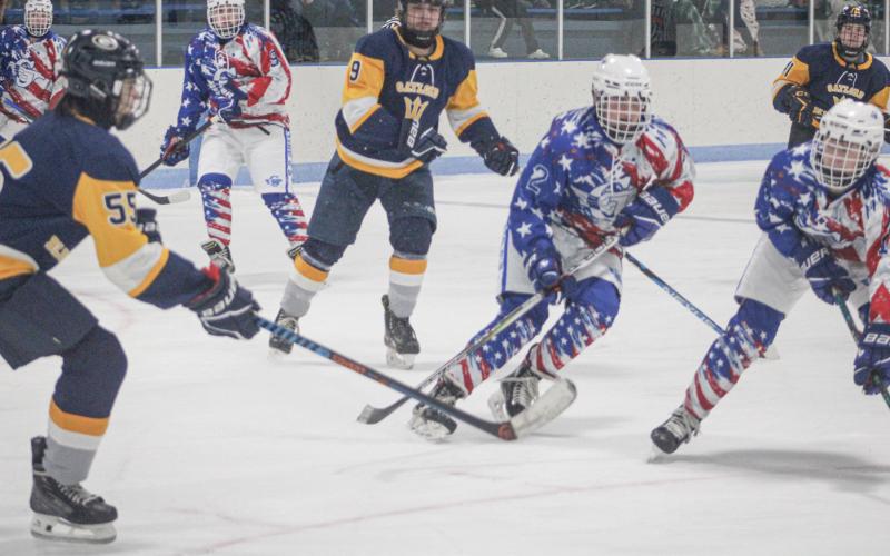 Gladwin’s Braeden Guzman gets ready to rip a wrist shot during Saturday’s victory over Gaylord, the third win of the week for the Flying G’s.