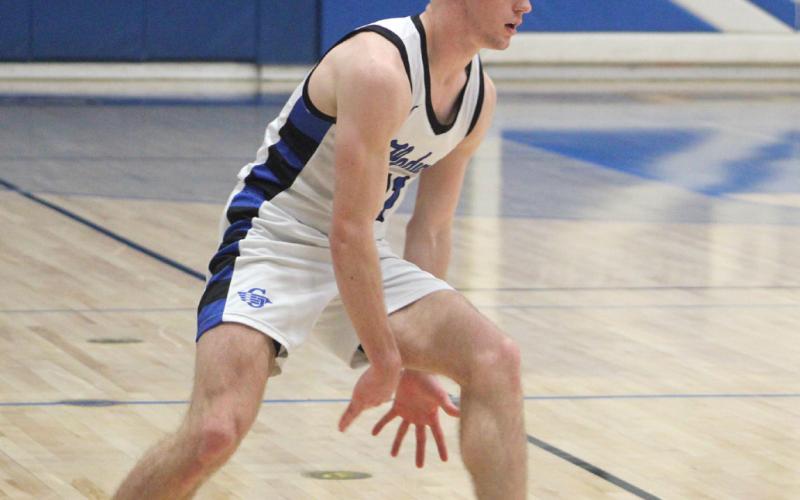 Gladwin’s Trace Corlew pounds the rock.