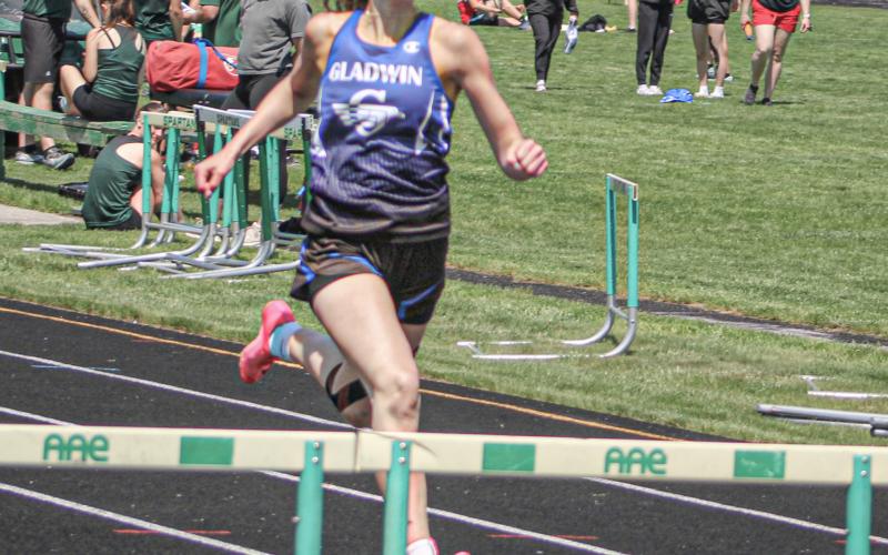 Gladwin’s record-setting hurdler Ava Gary is on the run during a recent meet. The senior is qualified to race in four events at the MHSAA Finals Saturday.