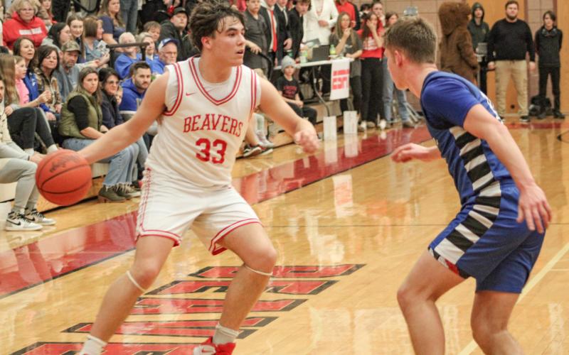 Beaverton’s Landon Love tries to put a move on Gladwin defender Jacob Pahl during last Tuesday night’s battle for the Jack Pine Conference championship.