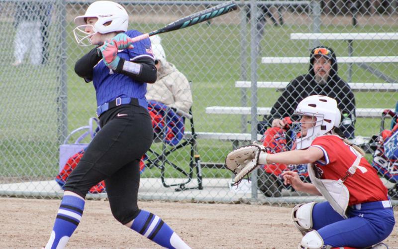 Gladwin’s Elizabeth Mickler makes contact during Friday’s doubleheader with visiting Remus Chippewa Hills.