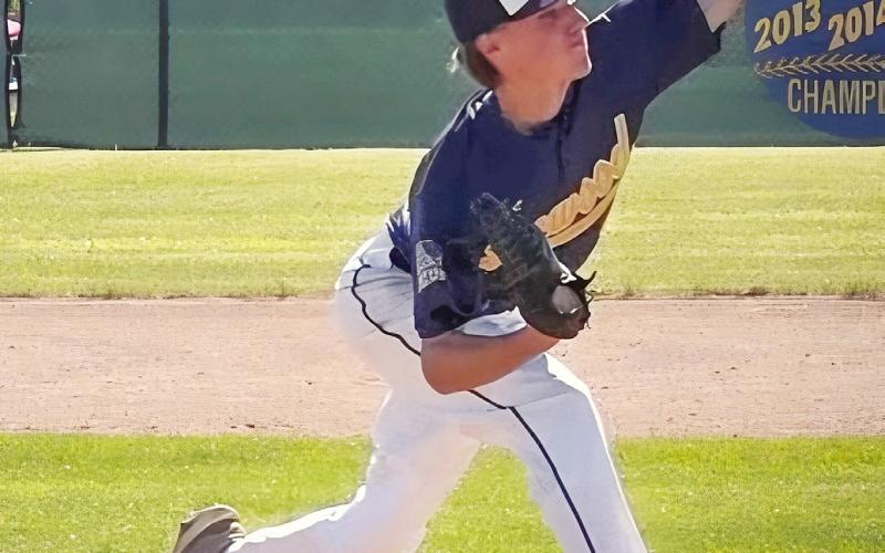 Carter McLaren delivers a pitch versus the MidMichigan Beavers.