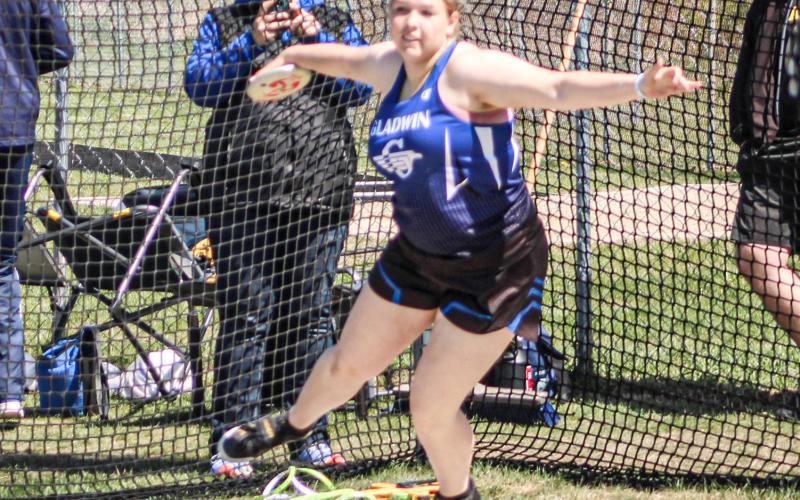 Gladwin thrower Makenzie Price put on a show at the Division 2 regional at Cadillac Friday, winning both the shot put and the discus and achieving school records in both events.
