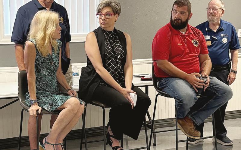 Pictured in back, George Alward; in front, left to right: Karen Moore, Angela Bigham, John Andrist, and Dwayne Miller.