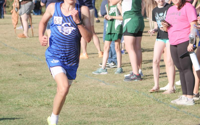 Gladwin’s Ben Verellen fights his way to a third-place finish at last week’s Jack Pine Conference jamboree at Pine River Golf Club in Standish. He went on to run second at an invitational Saturday.