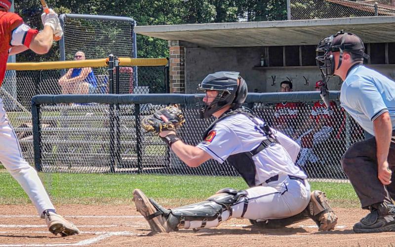 Bruce Neitzel was behind the plate in the heat Sunday when the Post 239 squad fell to the Detroit Metro Stars in the championship game.
