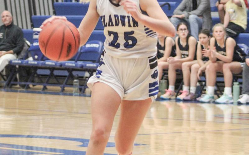 Gladwin’s Breanna Campbell charges up the court during Thursday’s Jack Pine Conference opener with Shepherd.