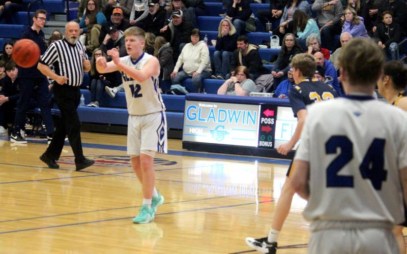 Gladwin attempts to pass the ball during Friday night’s game against Shepherd.