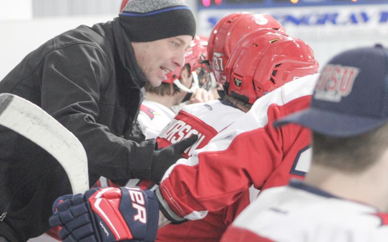 Saginaw Valley State assistant coach Bill von Matt passes along some instructions during Sunday’s game.