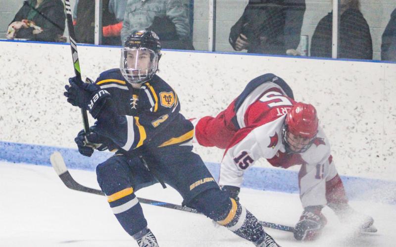 Gladwin alum Treyton Siegert battles behind the net during Saginaw Valley State’s victory over Toledo Sunday.