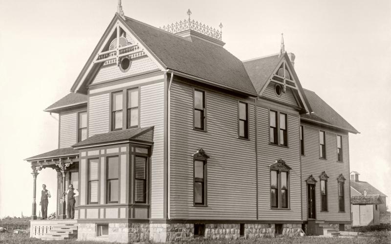 Isaac Hanna home located on Cemetery Road, note the headstones in the background at left.