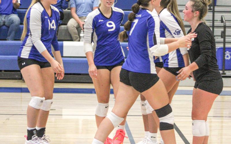 The Gladwin volleyball team had reason to celebrate after winning last Wednesday’s Jack Pine Conference opener over Farwell in three sets.