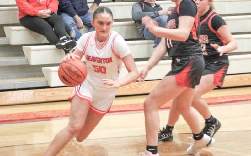 Beaverton’s Myah Hubble turns on the jets and blows by the defense on her way to the basket during last week’s victory over St. Louis.