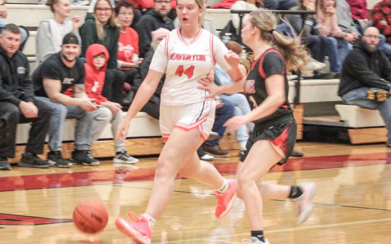 Brooke Remer brings the ball up the court during Beaverton’s victory over St. Louis last week.