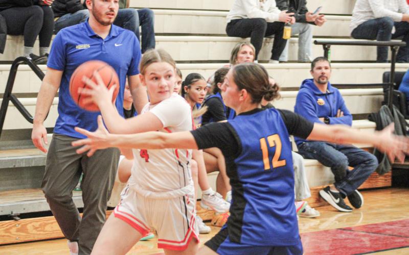 Beaverton’s Addisyn Barth looks inside for an open teammate during last week’s win over Harrison, the ninth in a row for the Beavers.