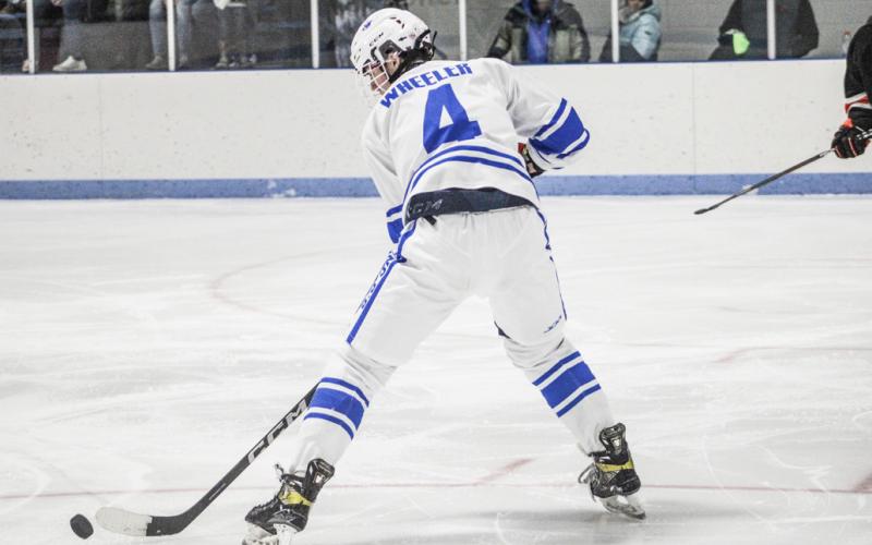 Gladwin’s Ike Wheeler scored four times during a six-goal flurry that sparked the Flying G’s to a comefrom- behind 8-4 victory at Troy Saturday.